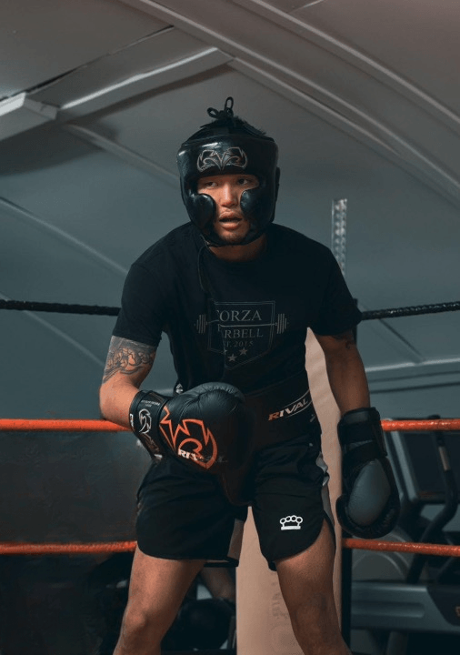 Boxer in training gear after a boxing session